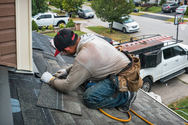 Professional Roofing technician working in North Bridgton, ME